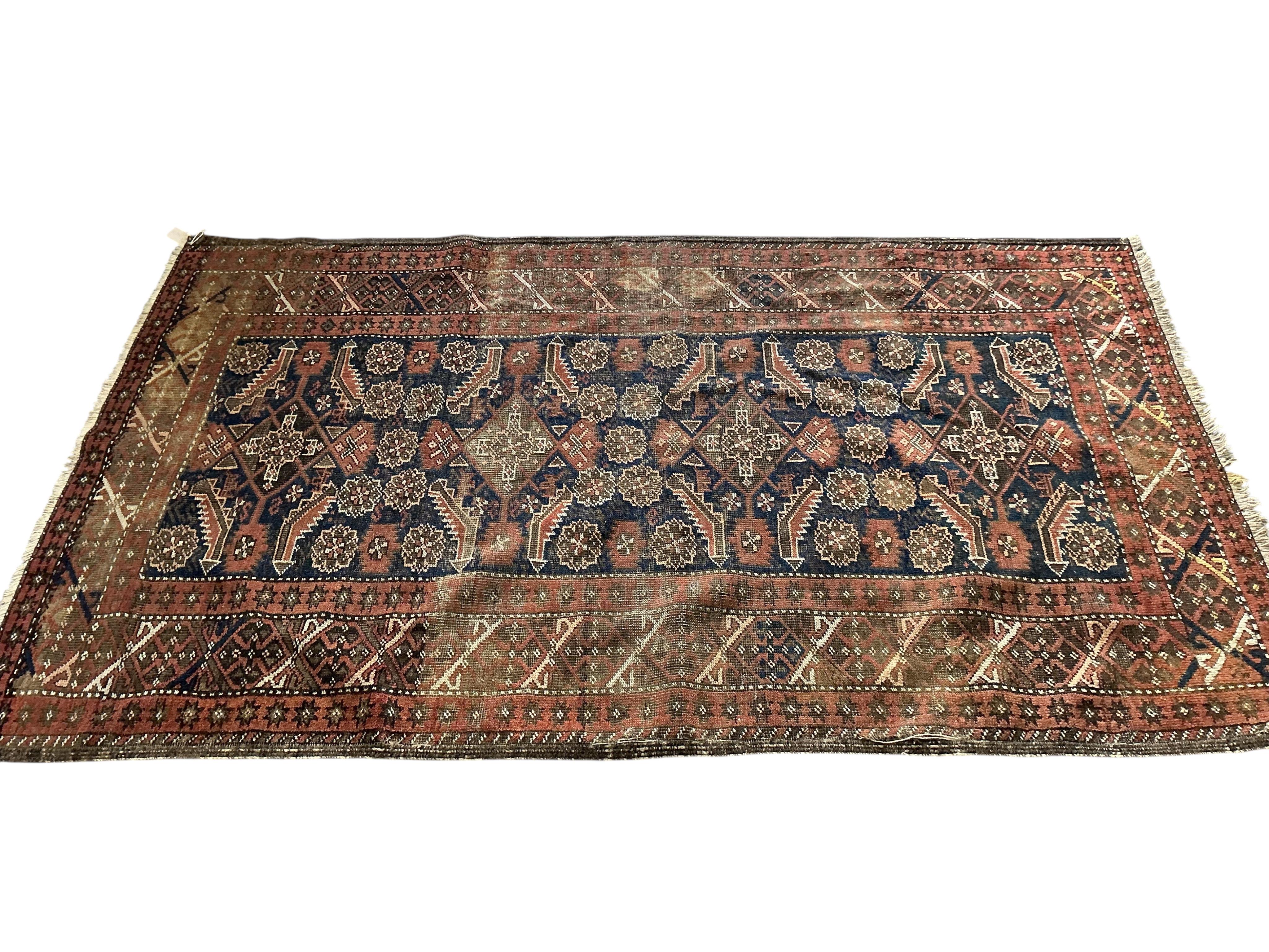 A late 19th century North West Persian blue ground rug, 206 x 123cm